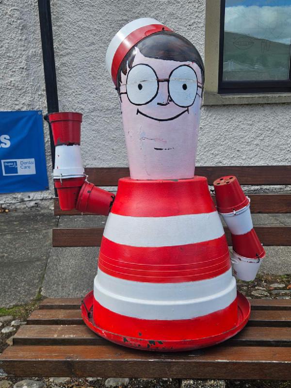 We found Wally. Easily identified by his red-and-white-striped shirt, bobble hat, and glasses
